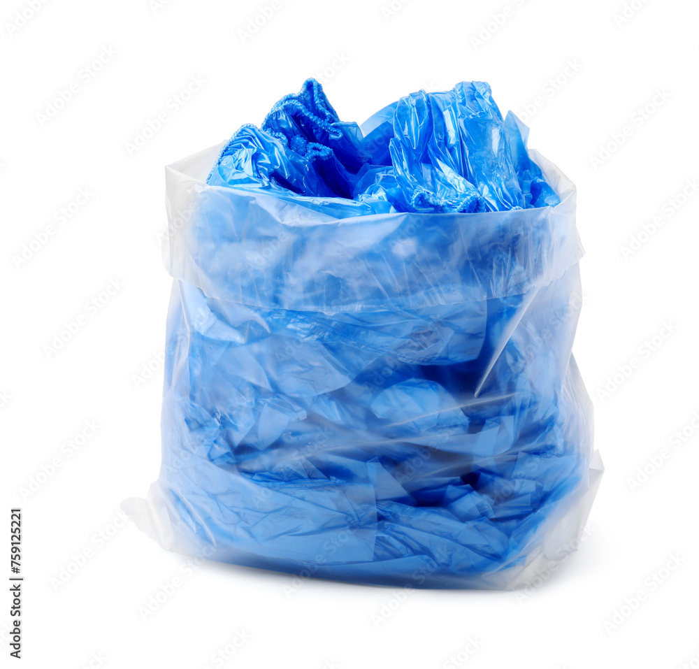 Blue medical shoe covers in package isolated on white Blue medical shoe covers in package isolated on white