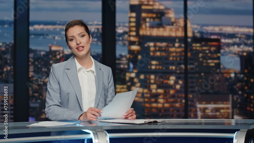 Friendly newsreader speaking newscast evening studio closeup. Tv broadcasting photo