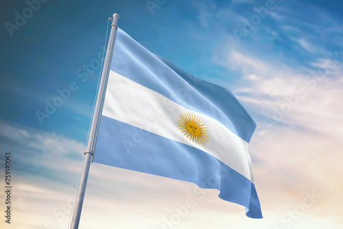 Waving flag of Argentina in blue sky. Argentina flag for independence day. The symbol of the state on wavy fabric.