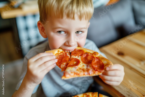 Youngster delights in pizza at cozy home