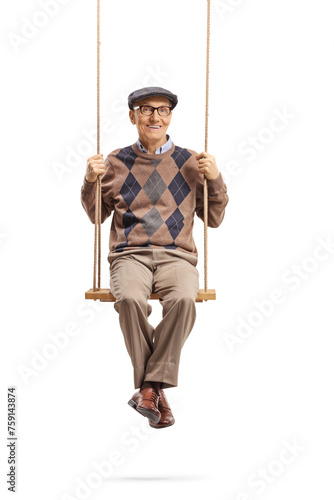Elderly man sitting on a wooden swing and smiling