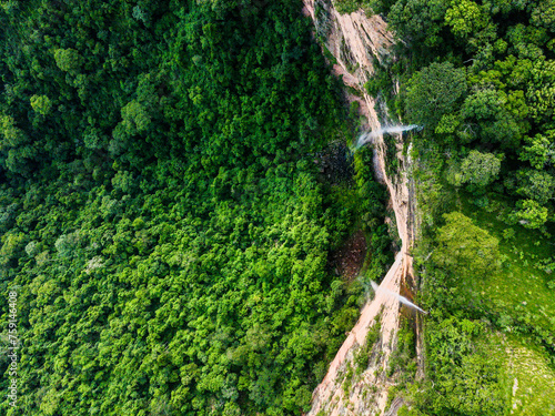 Aerial top down of waterfall in forest at Chapada dos Guimarães National Park in Mato Grosso