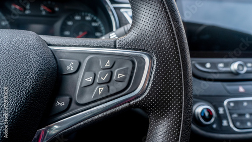 control of speakerphone and music on the steering wheel in a new car