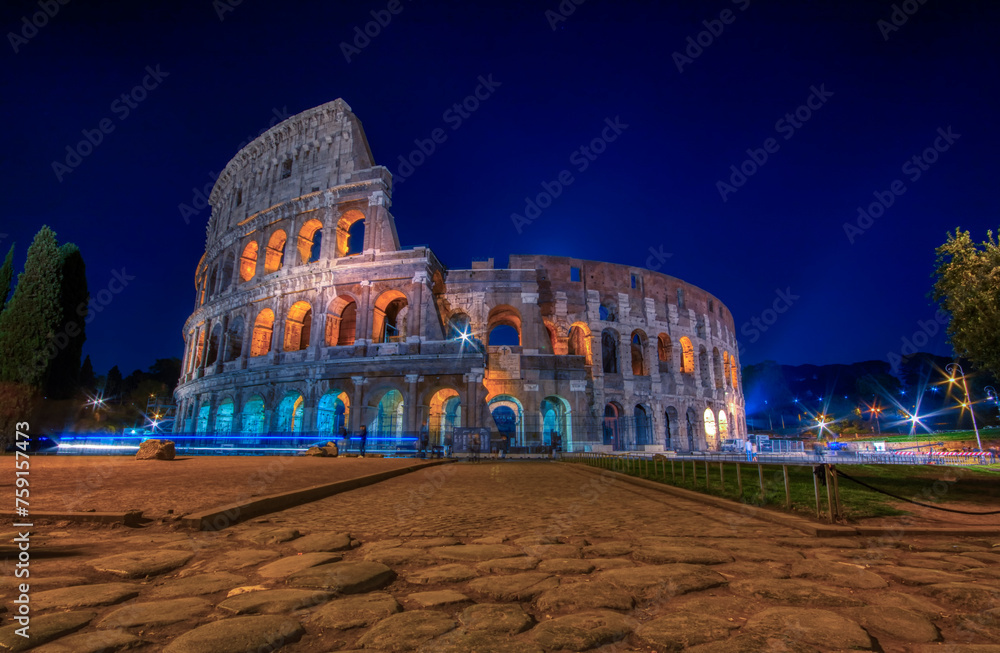 Colosseum illuminated in Rome. Blue hour.