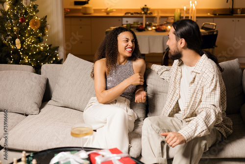 Christmas Romance: Couple's Sweet Date by the Tree photo