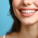 woman smiles with perfect white teeth. Dentistry concept, prosthetics and dental implantation.