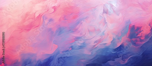 A closeup shot of a vibrant pink and blue background with swirling smoke resembling clouds. The mixture of purple, magenta, and violet creates a stunning art piece against the horizon