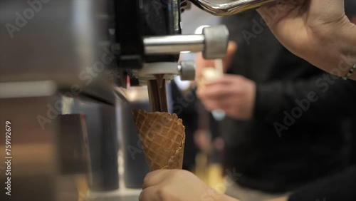 Woman makes a chocolate italian ice-cream
