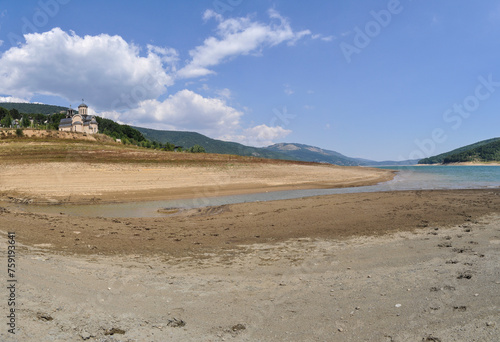 A panoramic view of Mavrovo Lake, artificially built in 1950. In recent years, due to lower rainfall, there is less water. A view of the receding water in the distance.
 photo