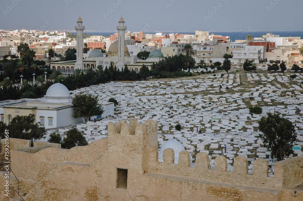 Fototapeta premium Sidi el Mezeri Muslim cemetery next to Mausoleum of Habib Bourguiba and walls of Ribat of Monastir, Tunisia