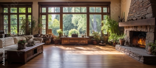 Spacious well-lit room with a fireplace and doors/windows