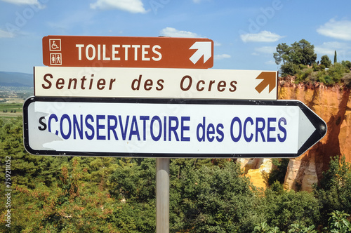 Direction sign to Sentier des Ocres - Ochre Trail nature park in Roussillon town photo
