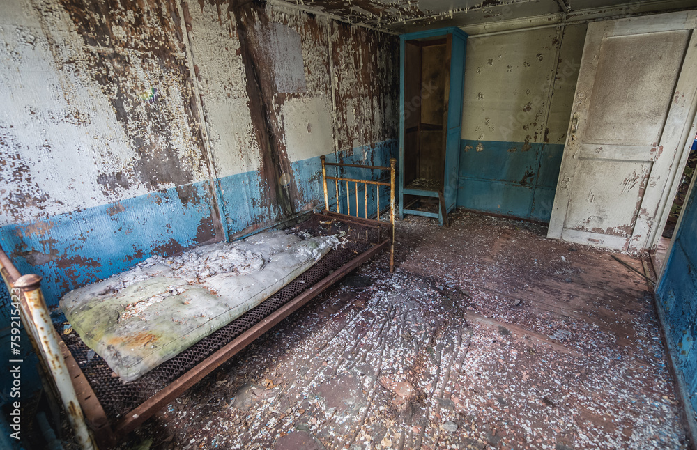 Bed in floating restaurant in Pripyat ghost city in Chernobyl Exclusion Zone in Ukraine