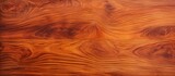 Polished wood surface on lacquered wood background.
