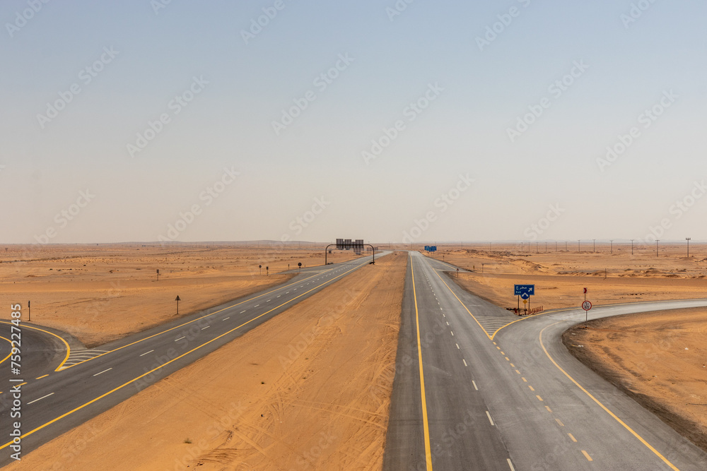 Highway 15 through desert near Al Muthallth, Saudi Arabia Highway 15 through desert near Al Muthallth, Saudi Arabia