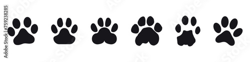 Paw icon vector illustration. paw print sign and symbol. dog or cat paw
