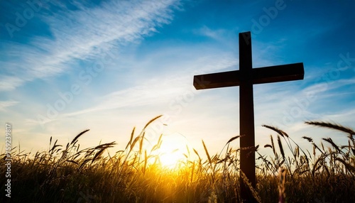 ascension day concept silhouette cross on meadow autumn sunrise background