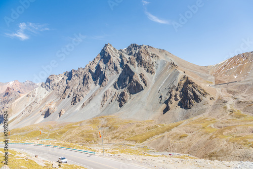 The beautiful scenery of snow-capped mountains along the Duku Highway in Xinjiang, China photo