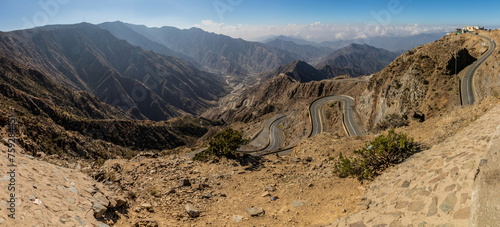 View of Wadi Hali in Al Souda mountains with a winding road near Abha, Saudi Arabia