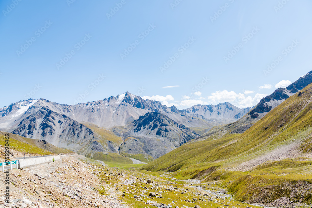 The beautiful scenery of snow-capped mountains along the Duku Highway in Xinjiang, China