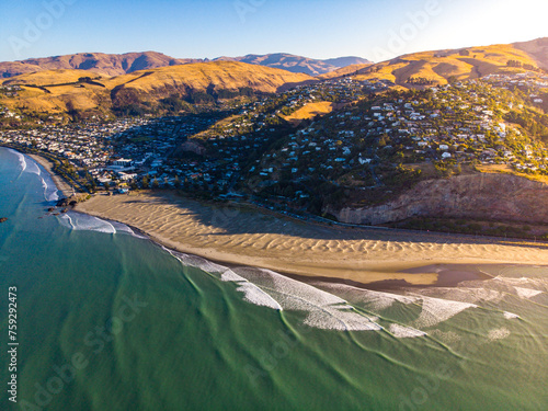 aerial panorama of christchurch city, new brighton beach, southshore and sumner beach at sunset;	