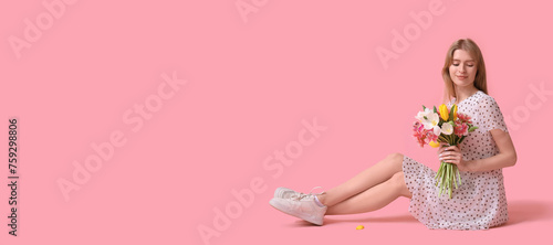 Pretty young woman with bou...