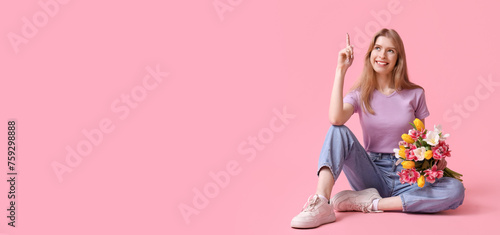 Pretty young woman with bou...