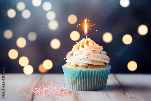 Delicious cupcake with sparkler on light wooden table
