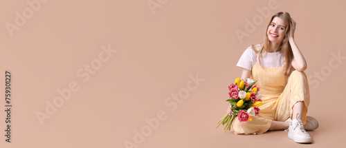 Pretty young woman with bou...