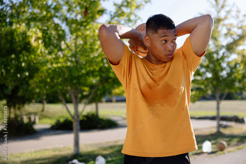 Sweaty basketball player looking to the side. Sweaty basketball player looking to the side.