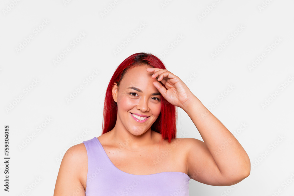 Young woman touching her forehead Young woman touching her forehead