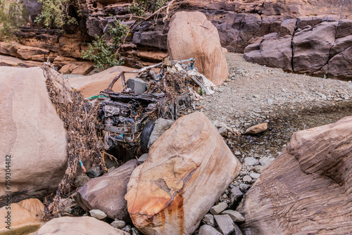 Car wreck in Wadi Lajab gorge, Saudi Arabia photo
