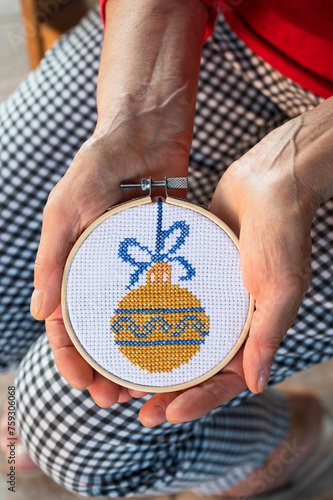 Handmade cross-stitch Christmas decoration