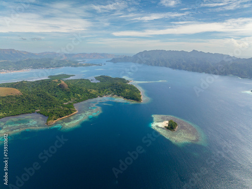 Drone view of Island with turquoise water and coral reefs. Lajala, Coron. Palawan. Philippines.