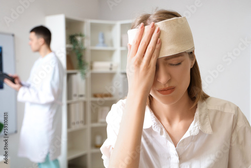 Young woman with brain concussion at neurologist's office, closeup photo