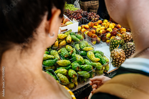Cactus fruits and other exotic fruits at the street market photo