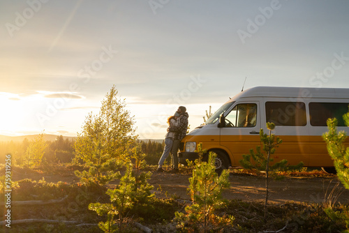 Happy couple camper van in nature photo
