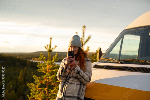 woman using phone travel photo