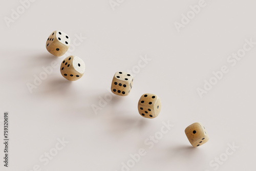 dices on a pink background with copy space photo