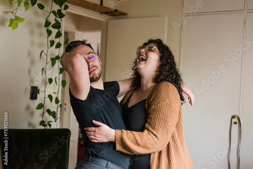 Fun couple portrait laughing photo