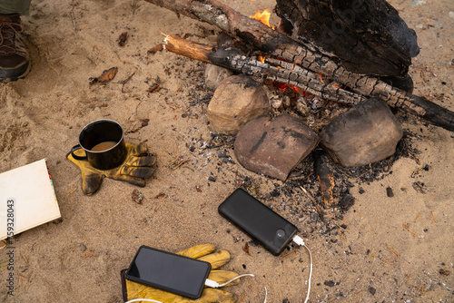 Bonfire and camper coffee cup photo