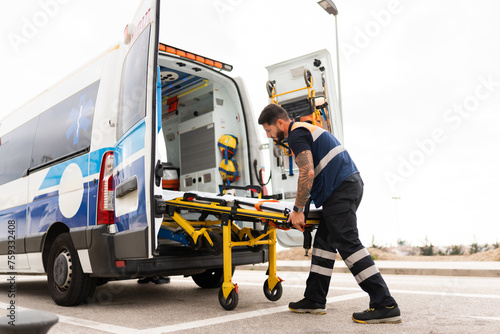 paramedic working on an ambulance. photo