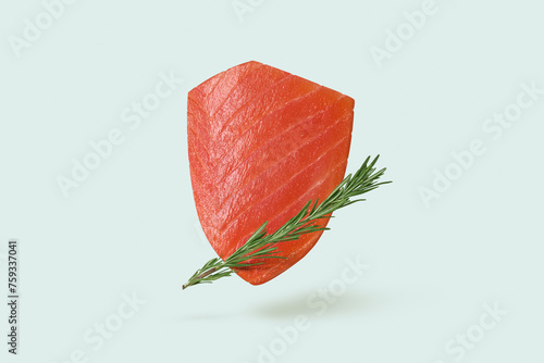 Salmon shield with rosemary branch photo