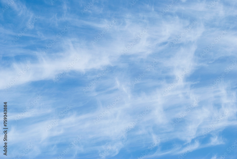gentle cirrus clouds in a bright blue sky gentle cirrus clouds in a bright blue sky