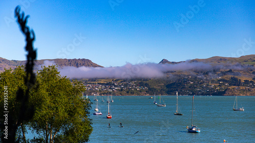 panorama of cass bay and banks peninsula as seen from pony point; famous coastal walk near christchurch and lyttelton, canterbury, new zealand south island photo