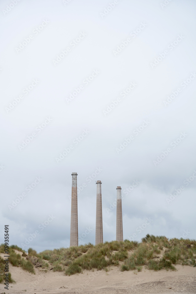 Three High Chimneys in sandy beach, California Three High Chimneys in sandy beach, California