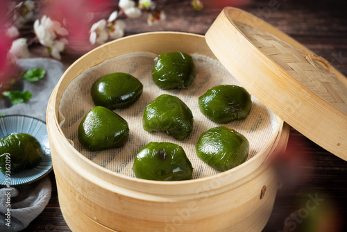 Oriental Chinese Sweet Green Rice Ball,Qingming festival snack. © zhikun sun