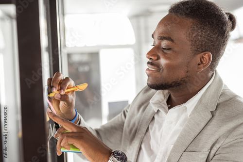 
young togolese businessman in a coworking office photo