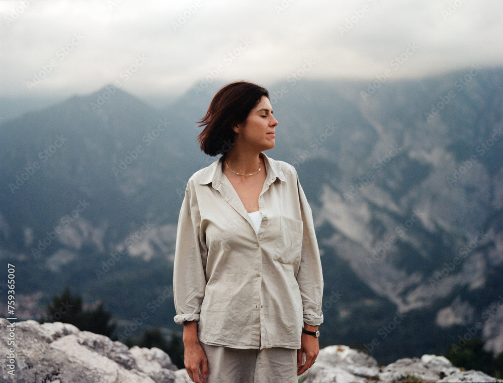 Atmospheric portrait of a woman in the mountains Atmospheric portrait of a woman in the mountains