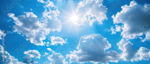Blue Sky with clouds and sun reflection